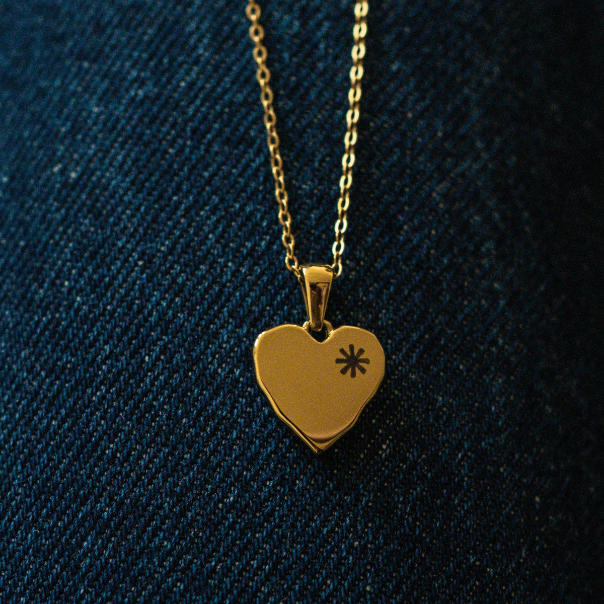 Back of the Indicta heart with an engraved star